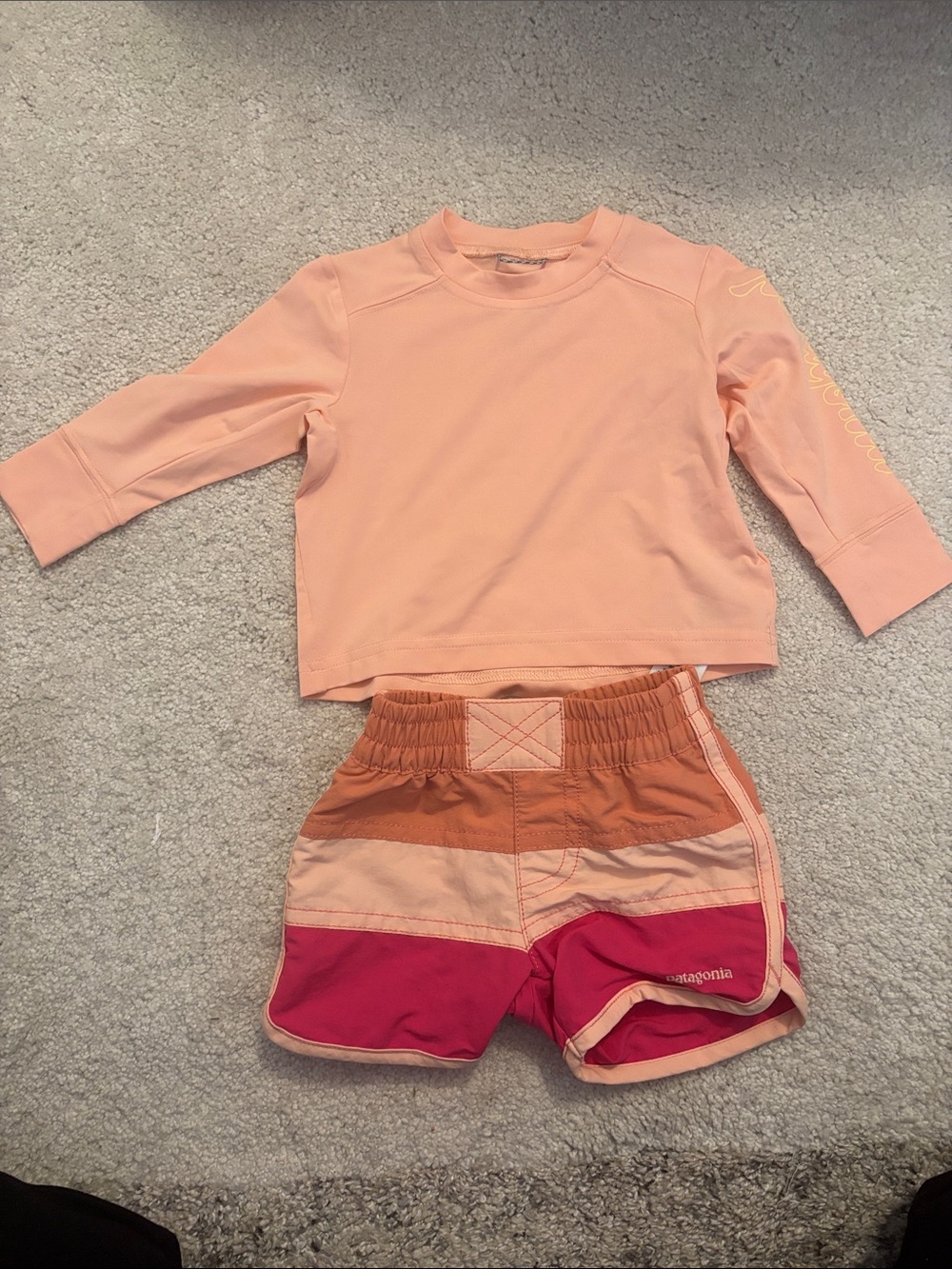 Patagonia Baby Peach Rashguard with Peach, Tan, and Deep Pink Colorblock Shorts